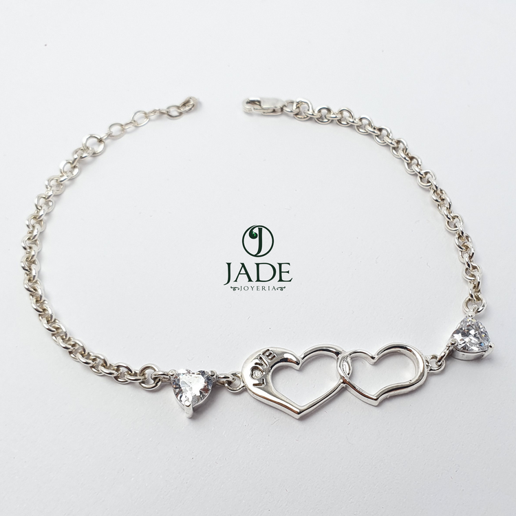 Pulsera con dos corazones entrelazados en plata fina – Jade18k