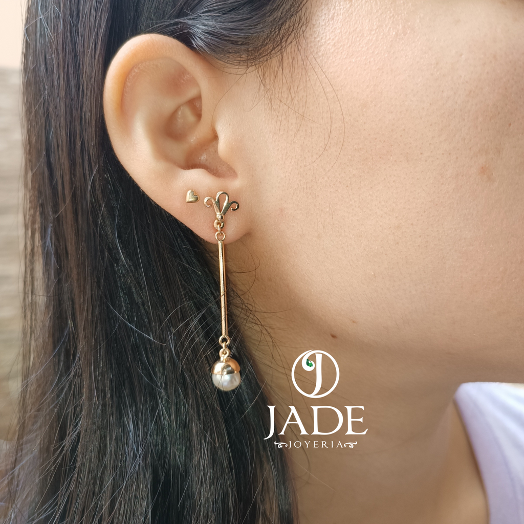 Aretes largos con perlas