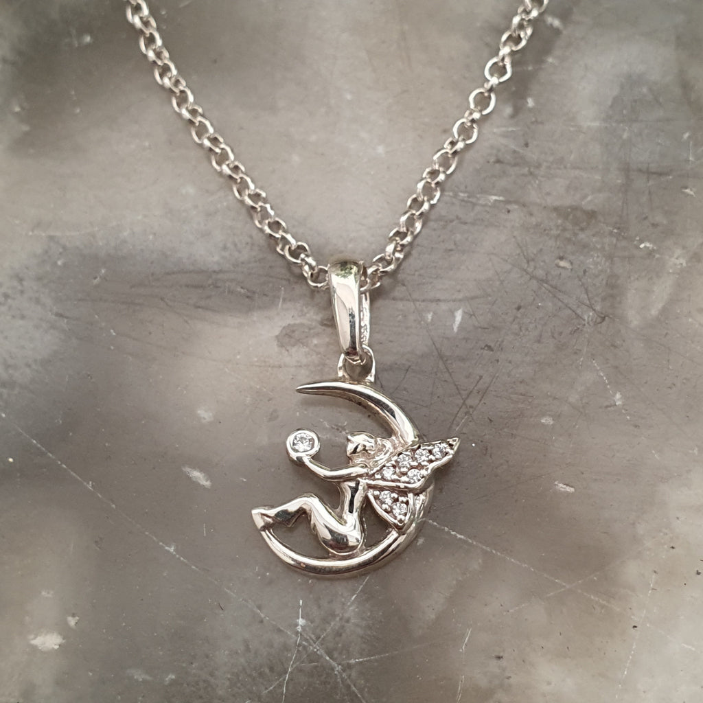 Dije de hada en plata ley