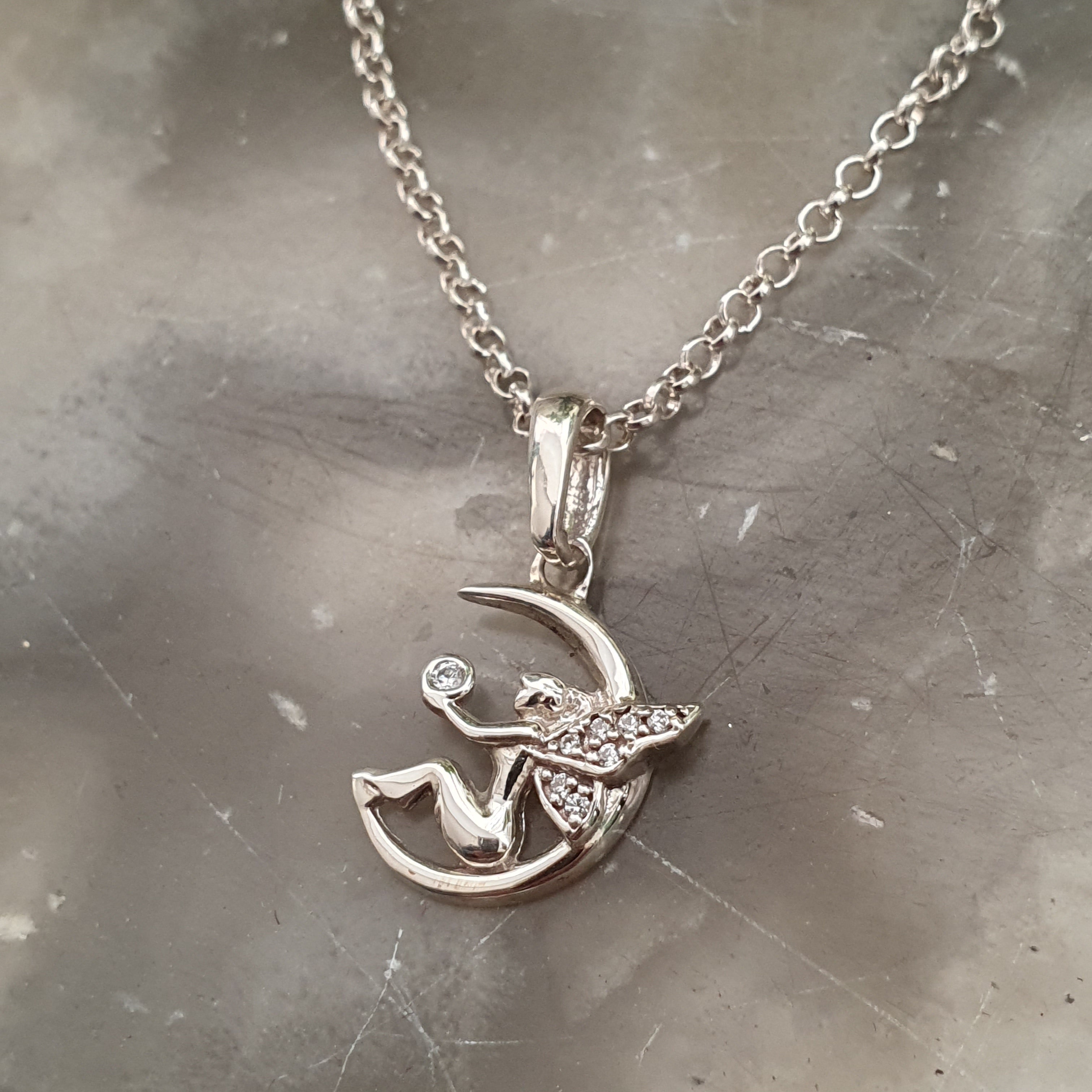 Dije de hada en plata ley