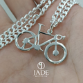 Dije de bicicleta en plata ley