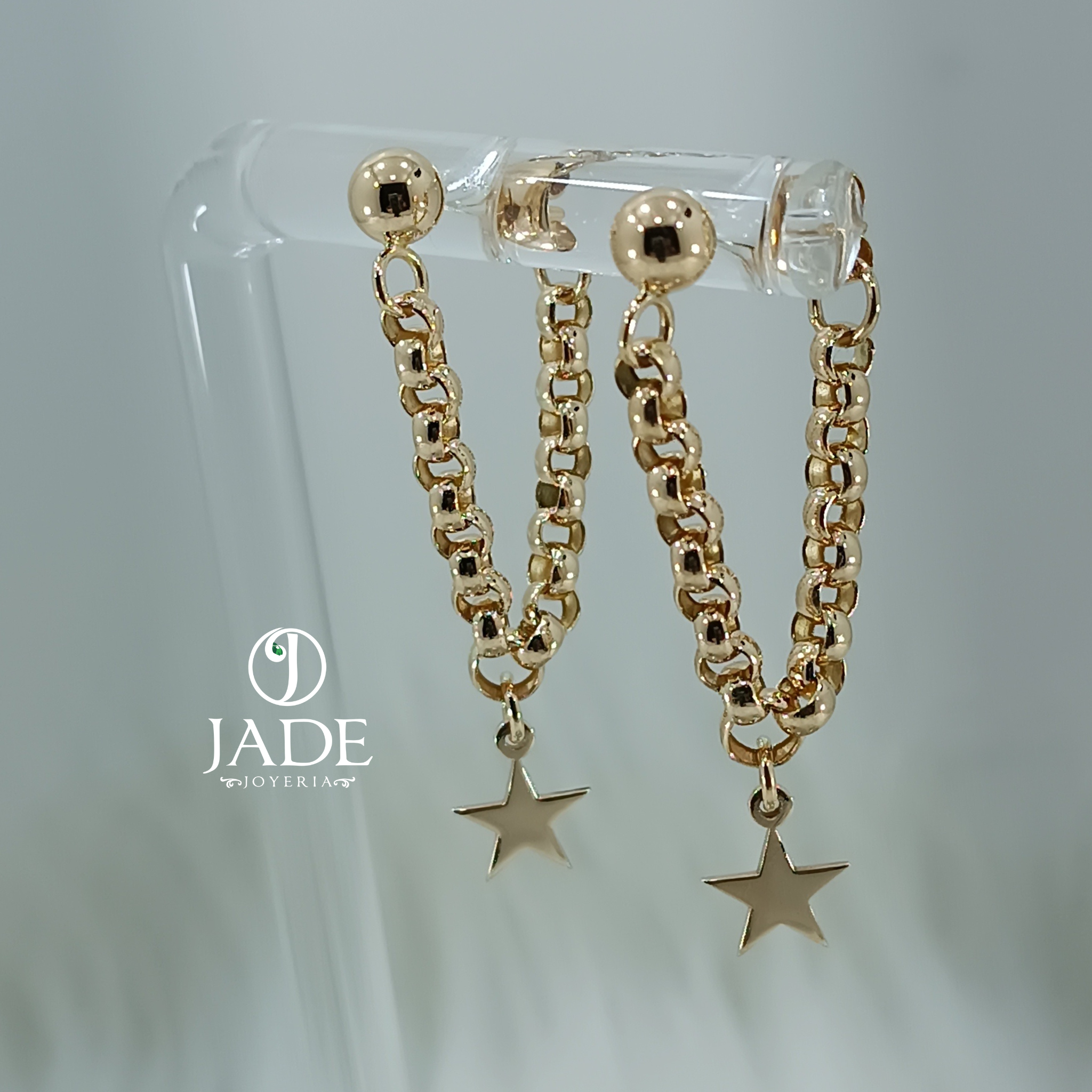 Aretes colgantes rolón con estrellas