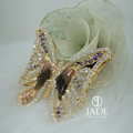 Dije de mariposa con piedras