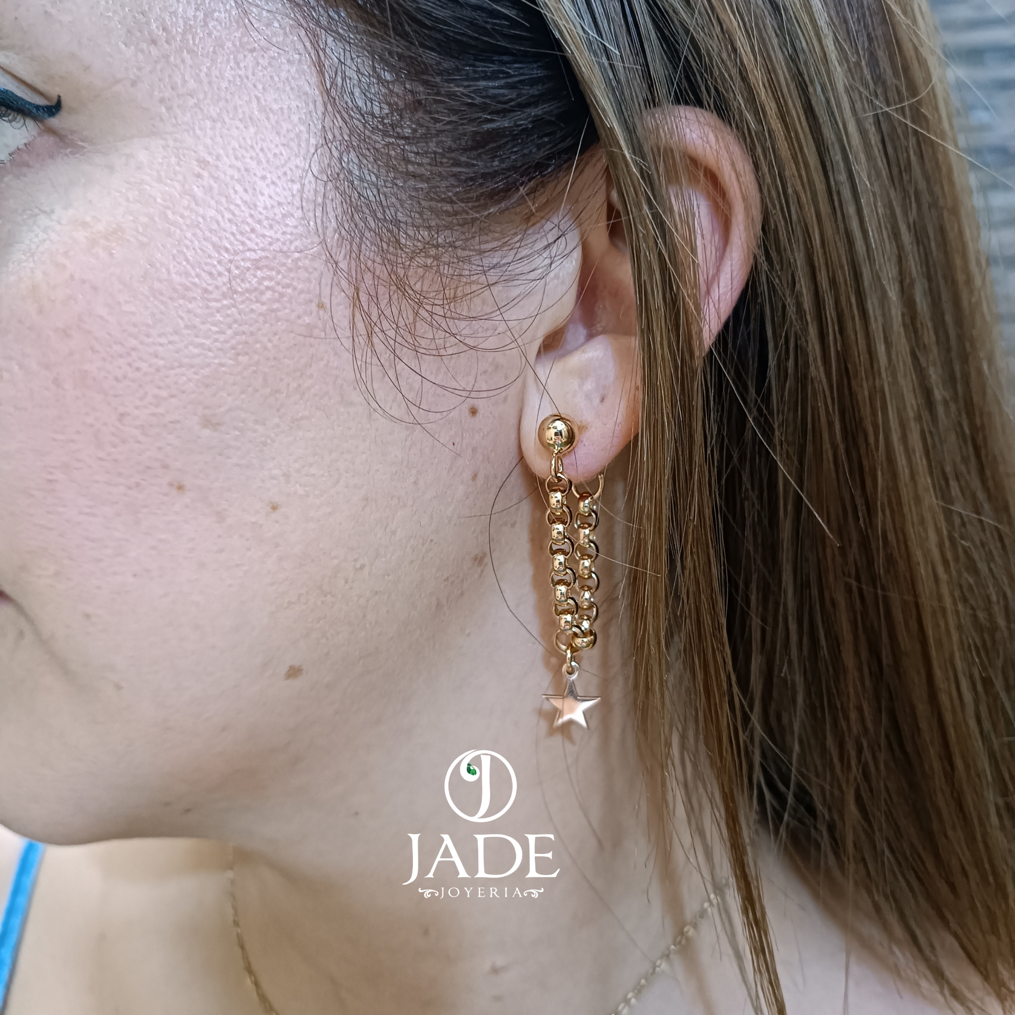 Aretes colgantes rolón con estrellas