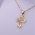 Dije de la cruz en 18k