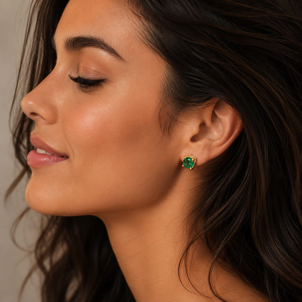 Aretes con esmeralda mariposa verde
