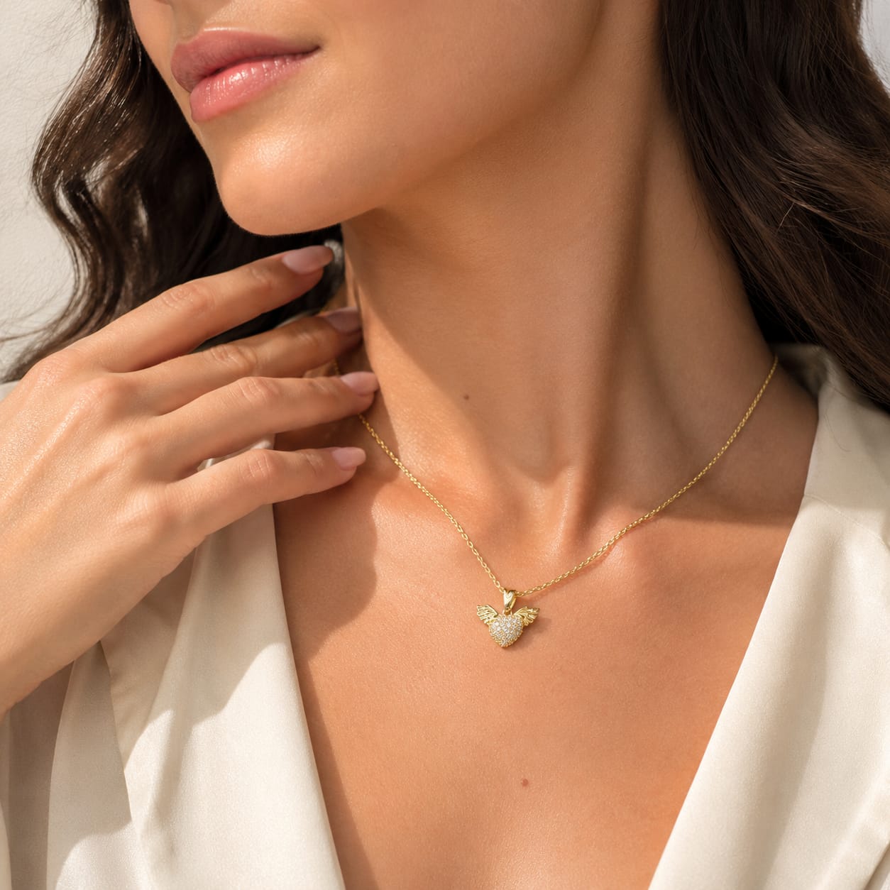 Dije corazón con Alas con Moissanite