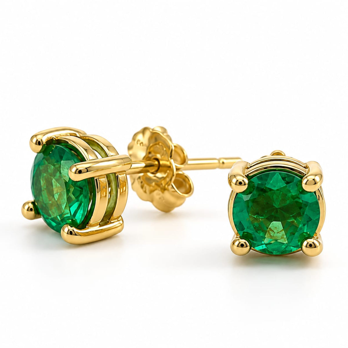 Aretes con esmeralda mariposa verde