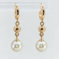 Argollas colgantes con perlas