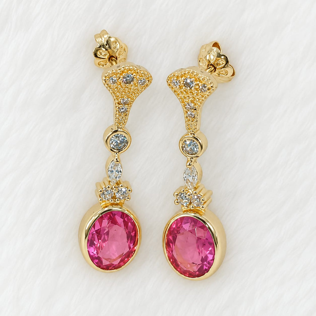 Aretes largos con piedra rosada