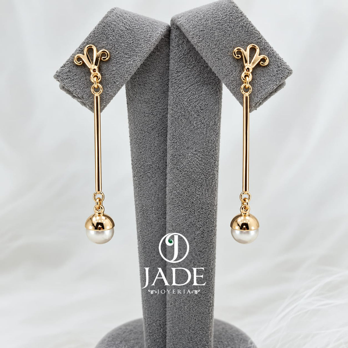 Aretes largos con perlas