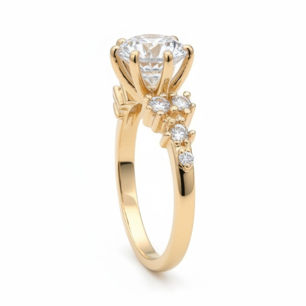 Jade18k engagement ring with a large moissanite center stone and smaller stones on the band, crafted in 18k orange gold.