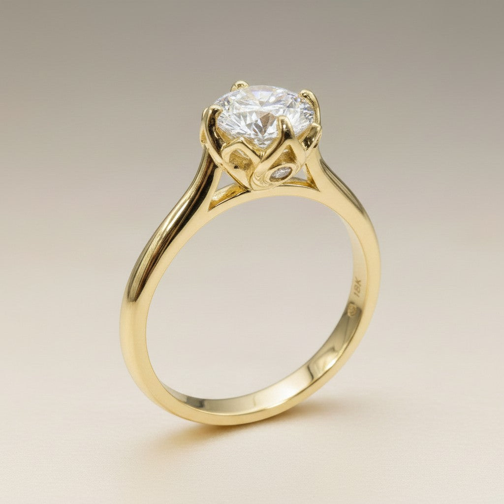 Jade18k 18k yellow gold engagement ring with a large round-cut cubic zirconia and small accent stones.