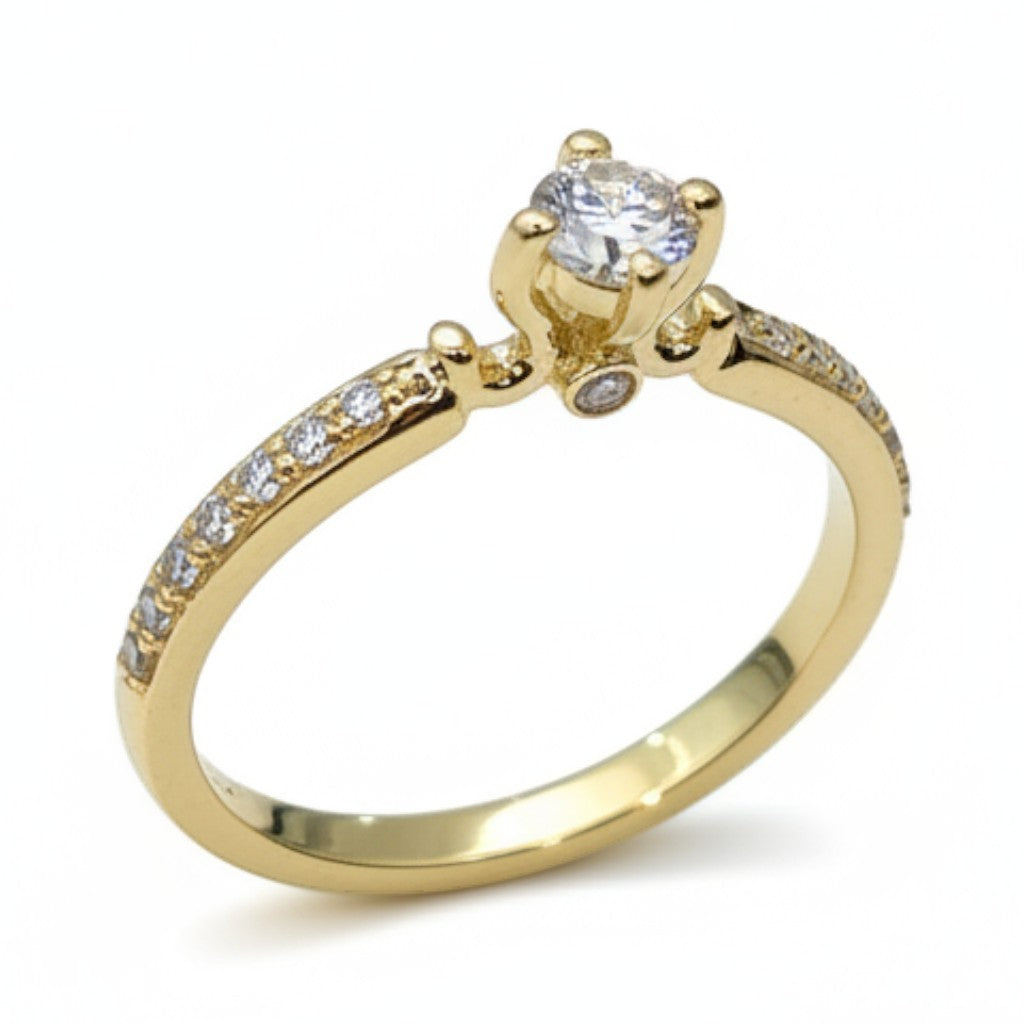 Jade18k 18k yellow gold engagement ring with a central moissanite stone and pavé-set stones along the band.