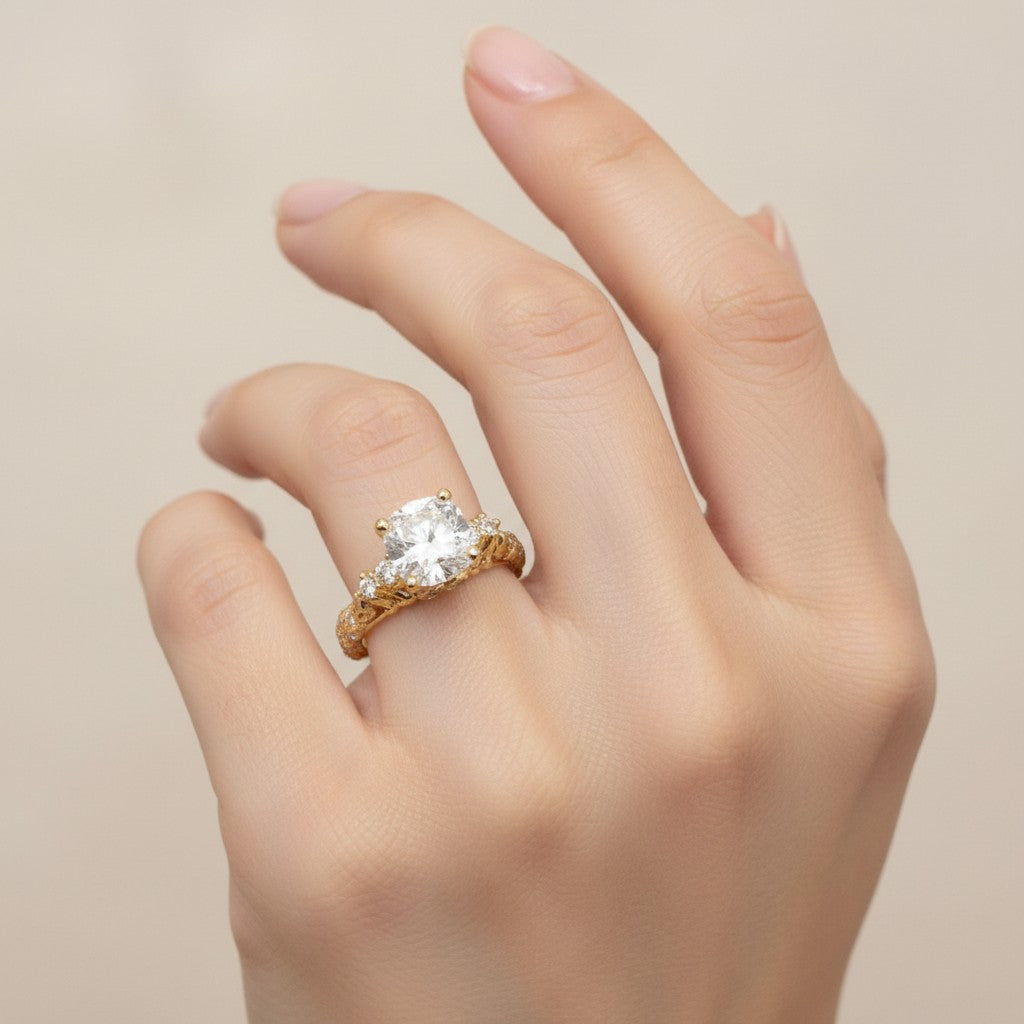 Jade18k Camila engagement ring in 18k orange gold with a central cubic zirconia and intricate detailing.