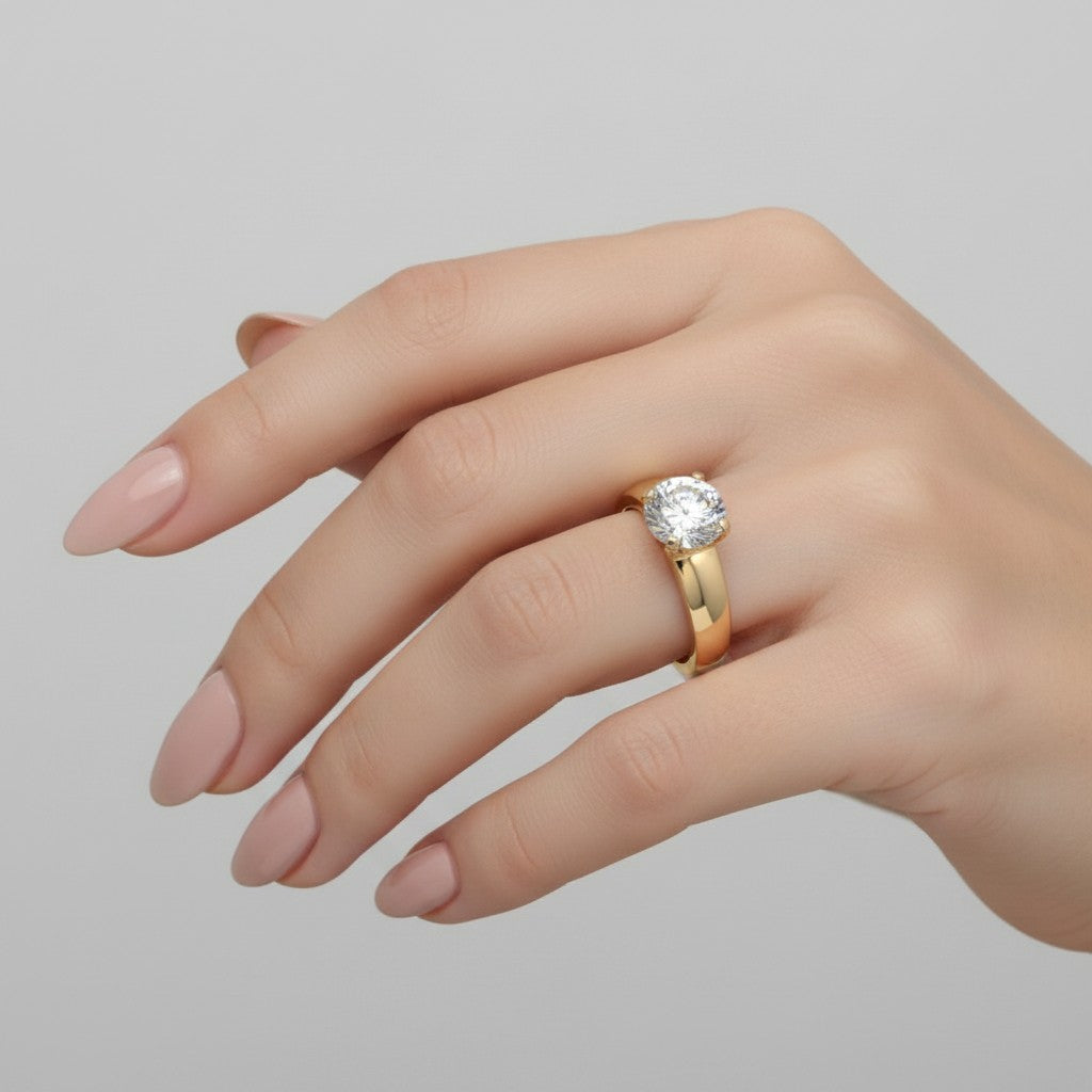Jade18k engagement ring in 18k orange gold with a round cubic zirconia stone and 9 grams weight.
