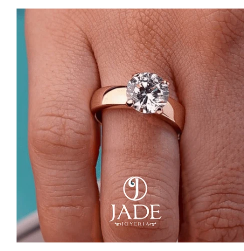Jade18k engagement ring in 18k orange gold with a large round cubic zirconia stone.