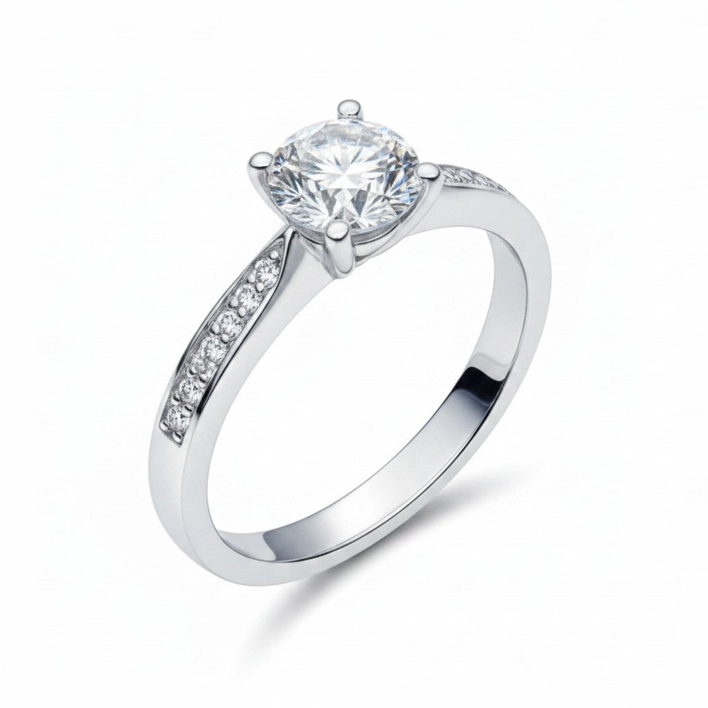 Jade18k Eugenia engagement ring in Sterling Silver 970 with a round-cut cubic zirconia and pavé accents on the band.