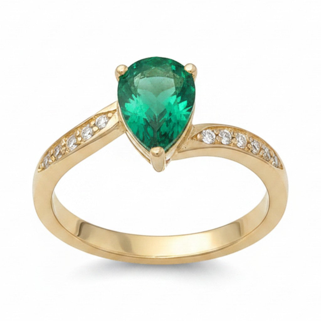 Jade18k yellow gold ring with a pear-cut green zircon center and moissanite side stones.