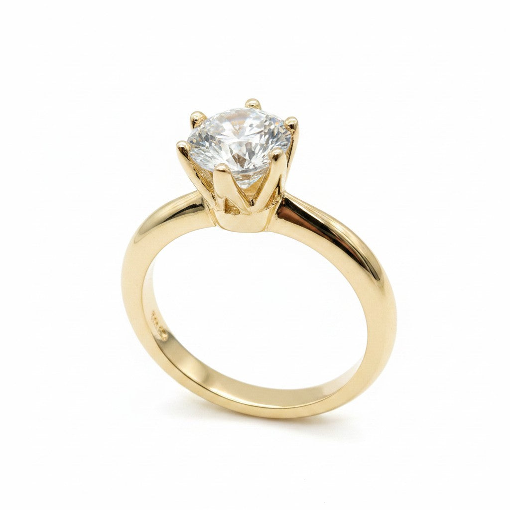 Jade18k Mi Reina engagement ring in 18k orange gold with a round cubic zirconia stone.