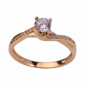 Jade18k Paulina engagement ring in 18k orange gold with a central cubic zirconia and pavé details.