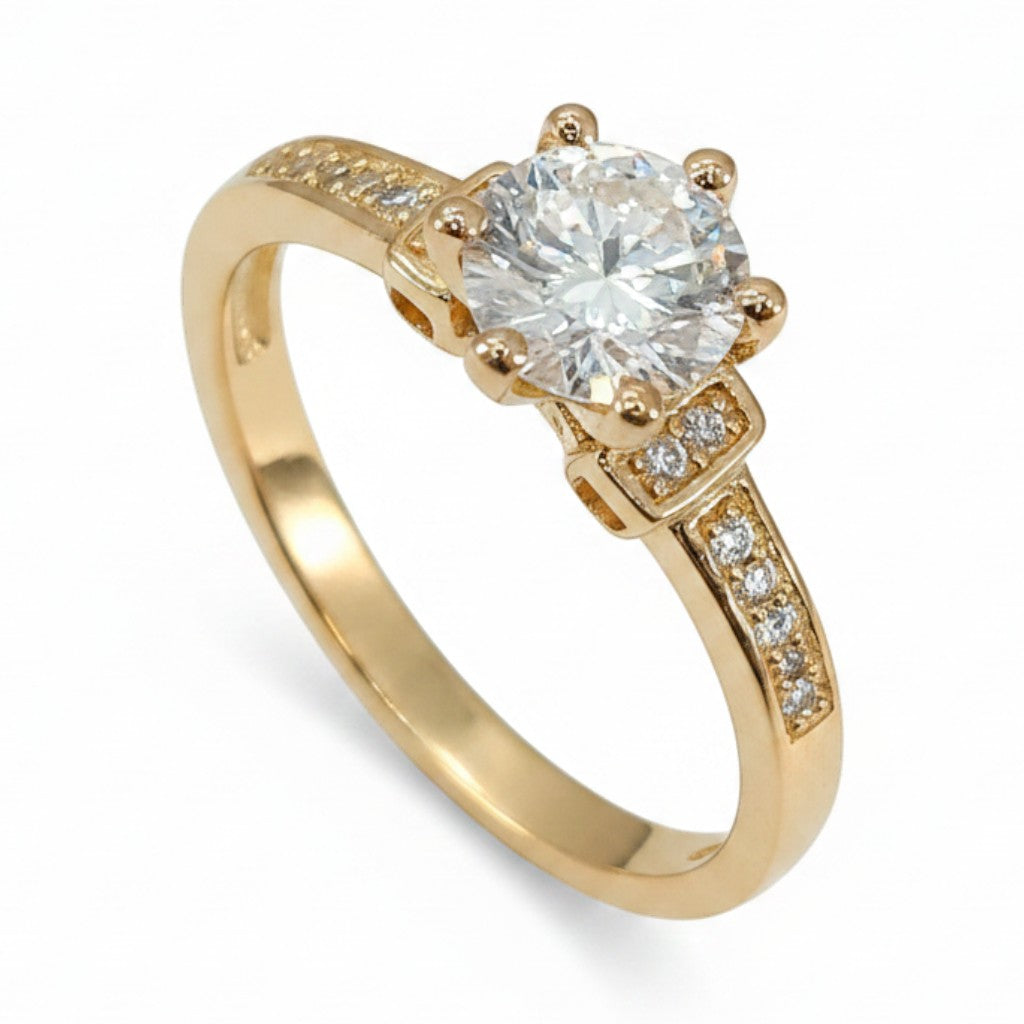 Jade18k 18k orange gold engagement ring with a round-cut cubic zirconia and small accent stones on the band.
