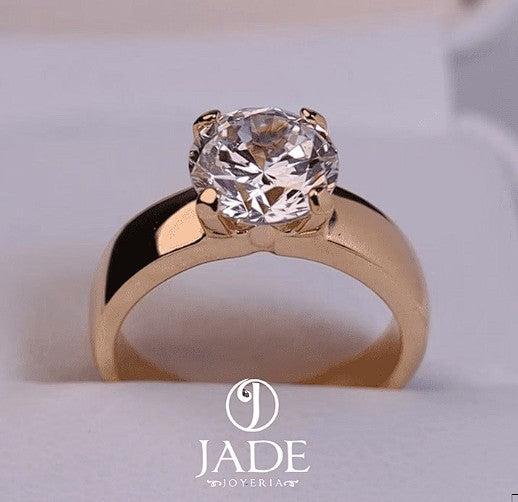 Jade18k engagement ring in 18k orange gold with a large round cubic zirconia stone.