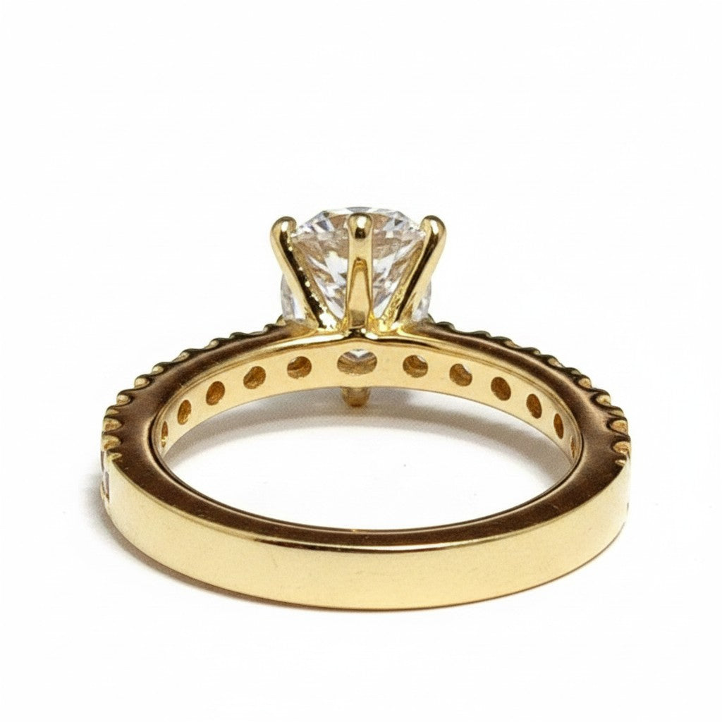 Jade18k engagement ring in 18k orange gold with a round cubic zirconia and pavé band.