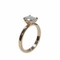 Jade18k engagement ring in 18k orange gold with a marquise-cut cubic zirconia stone.