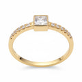Jade18k Laura engagement ring in 18k orange gold with a princess-cut cubic zirconia and small cubic zirconia accents.
