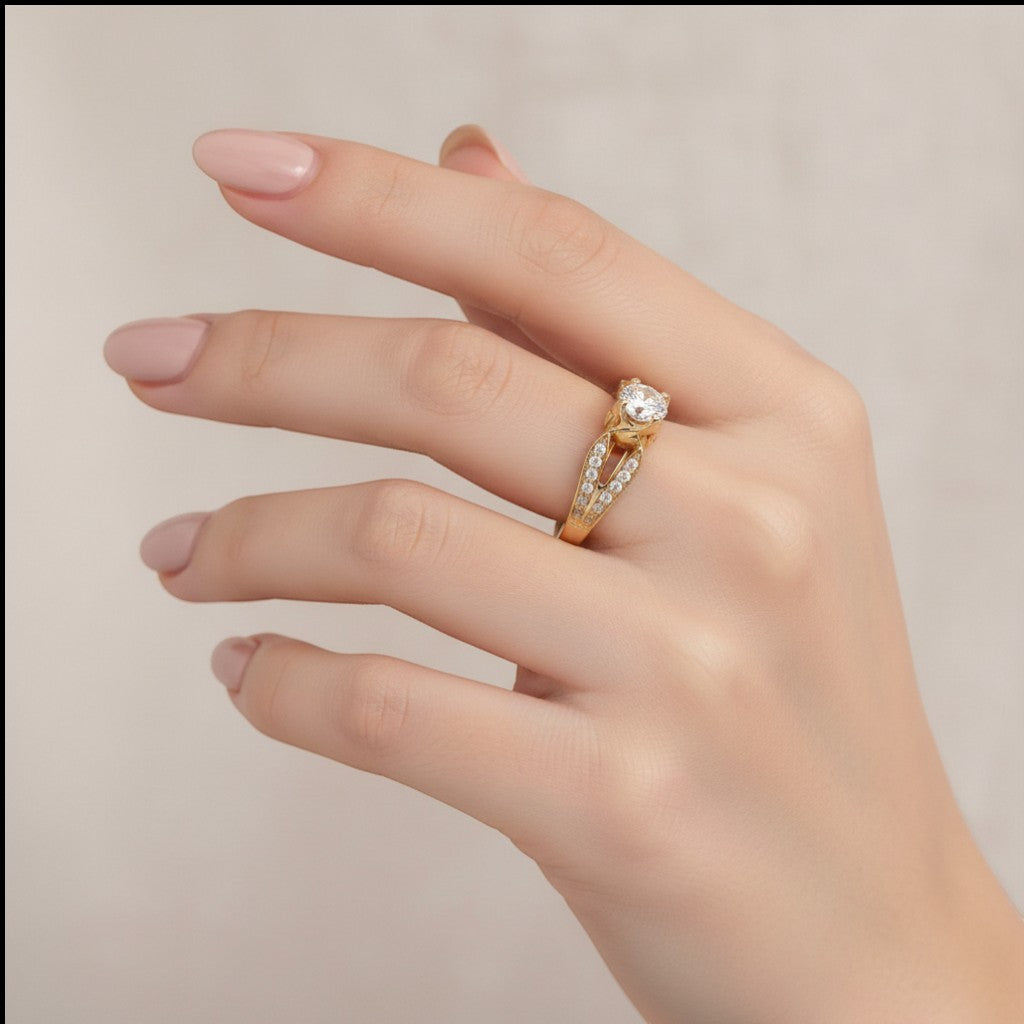 Jade18k 18k orange gold engagement ring with a central zircon stone and small stones on the band.