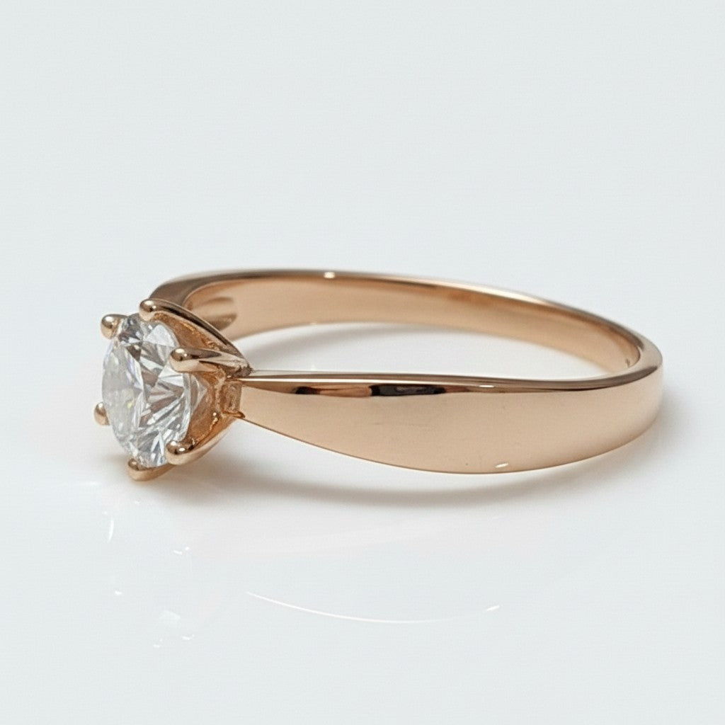 Jade18k Helena engagement ring in 18k orange gold with a round-cut zircon stone, 4.5g.