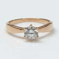 Jade18k Helena engagement ring in 18k orange gold with a round-cut zircon stone and a 6-prong setting.
