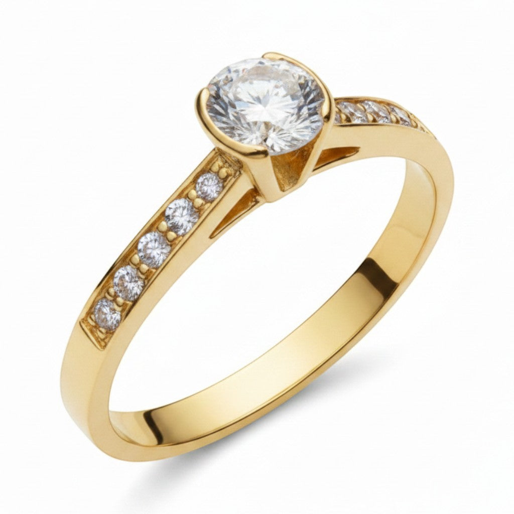 Jade18k Elemental engagement ring in 18k orange gold with a central zircon stone and small stones on the band.