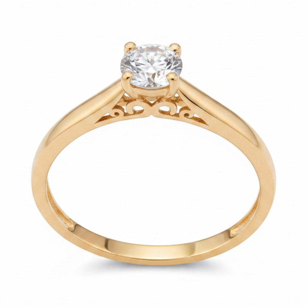 Jade18k Yesabel engagement ring in 18k orange gold with a zircon stone and intricate detailing on the band.