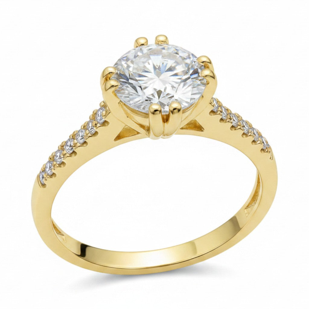Jade18k 18k orange gold engagement ring with a heart-shaped moissanite center stone and small moissanite side stones.