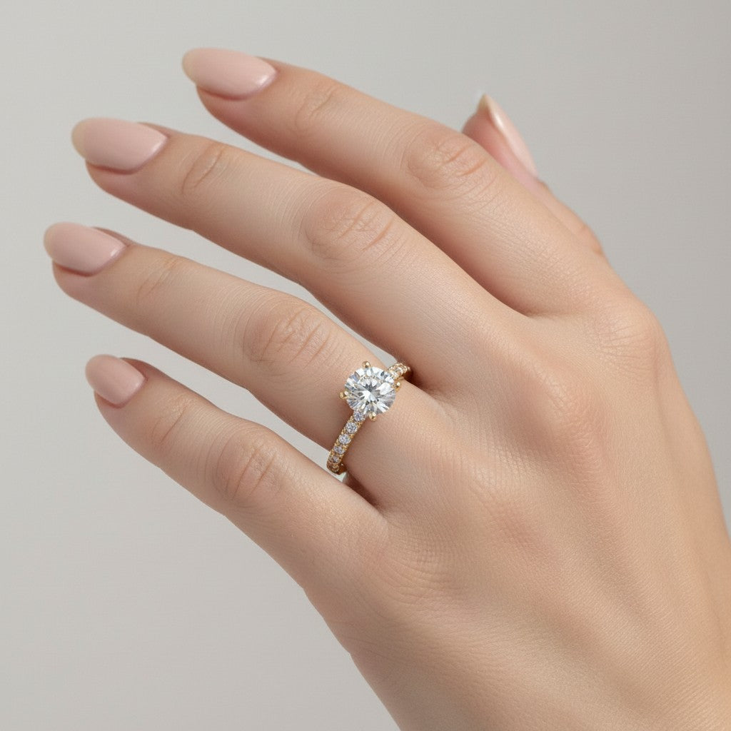 Jade18k Angella engagement ring with moissanite stones in 18k orange gold, pavé band.