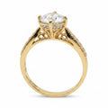 Jade18k 18k orange gold engagement ring with moissanite center stone and pavé band.