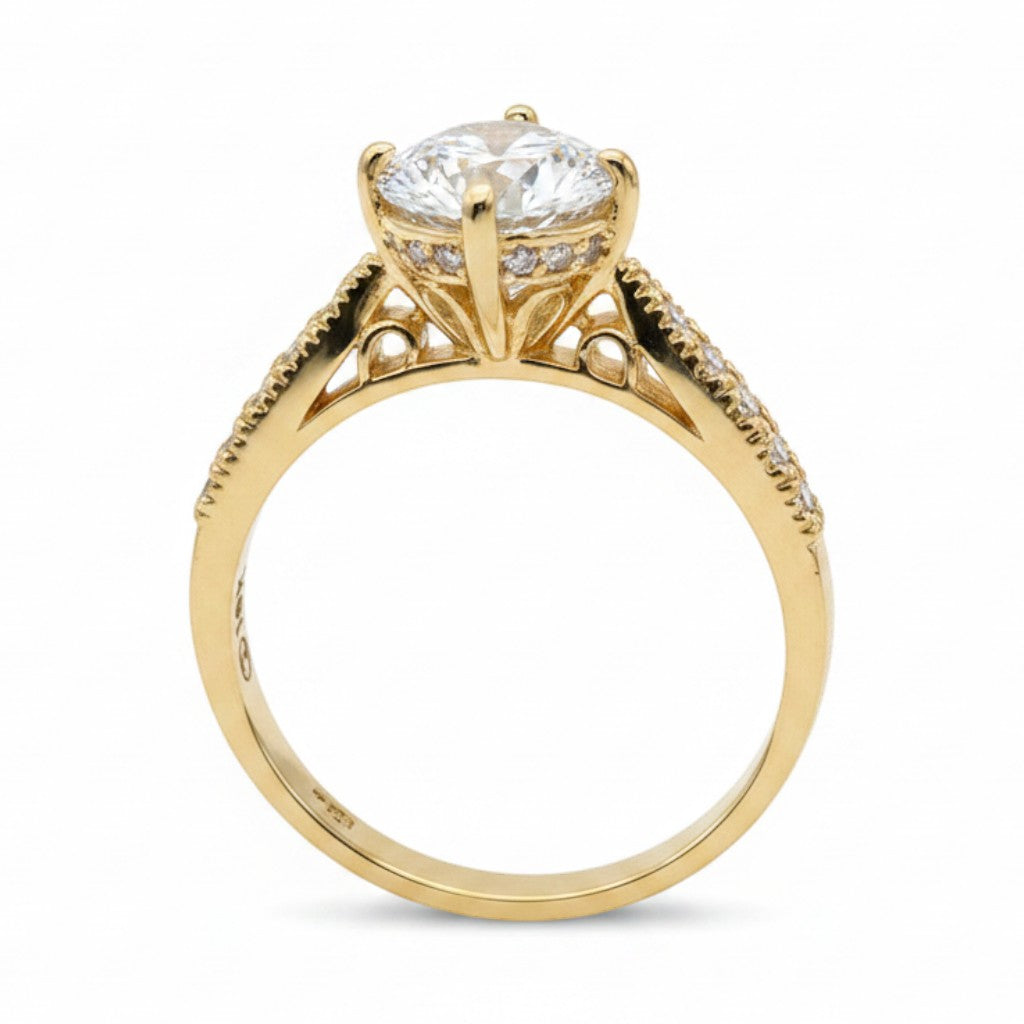 Jade18k 18k orange gold engagement ring with moissanite center stone and pavé band.