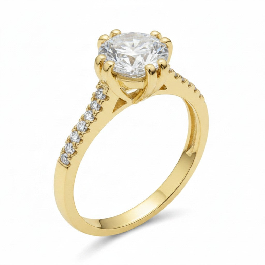 Jade18k 18k orange gold engagement ring with a large round moissanite center stone and smaller moissanite accent stones on the band.