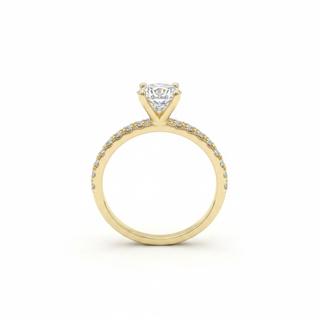Jade18k Angella engagement ring with moissanite stones set in 18k orange gold with pavé band.
