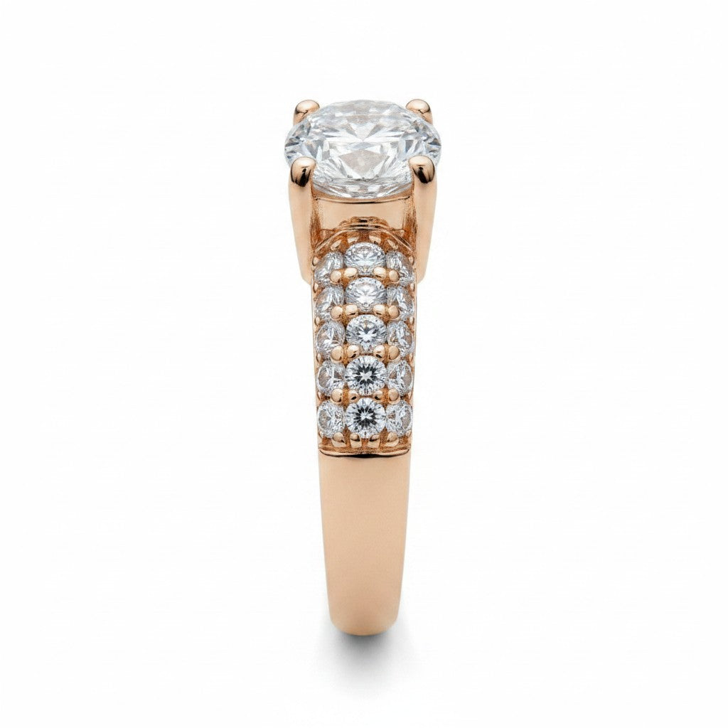 Jade18k 18k orange gold ring with pave set cubic zirconia stones and a large center stone.