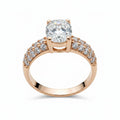 Jade18k Dominio Absoluto 18k orange gold ring with pave cubic zirconia band and large center stone.