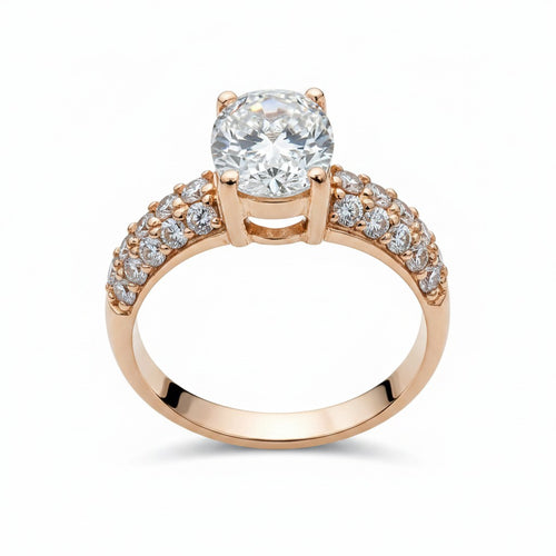 Jade18k Dominio Absoluto 18k orange gold ring with pave cubic zirconia band and large center stone.