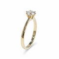 Jade18k Destello Infinito ring in 18k orange gold with a round-cut zircon stone, 4 grams.