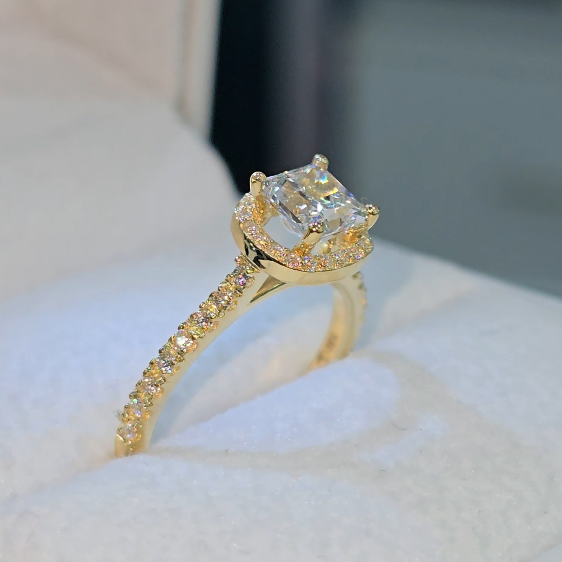Jade18k 18k yellow gold princess cut diamond engagement ring with moissanite side stones.