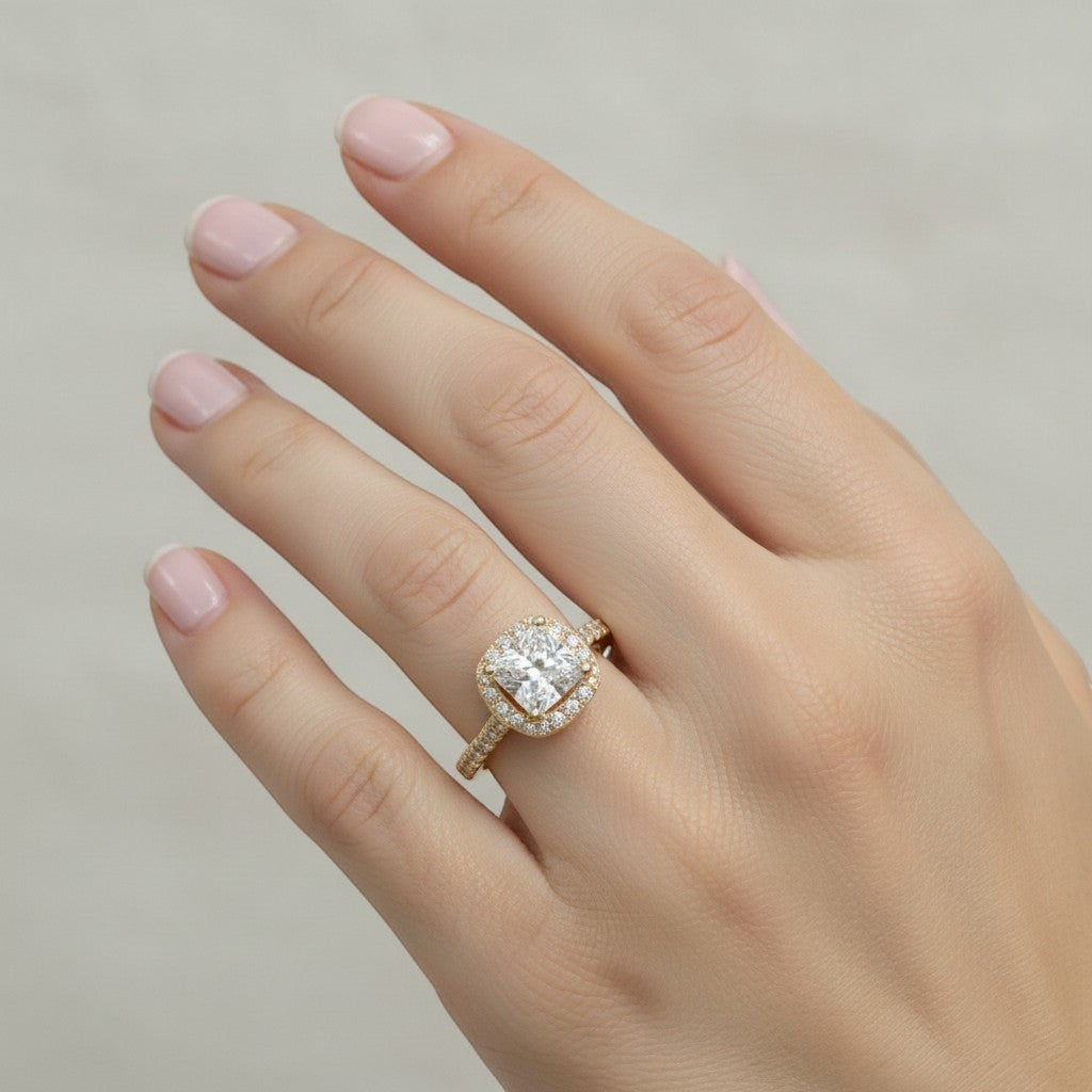 Jade18k 18k yellow gold princess cut diamond engagement ring with halo of moissanite side stones.