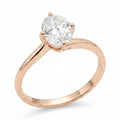 Jade18k Amor Verdadero 18k rose gold engagement ring with a sparkling oval-cut diamond.