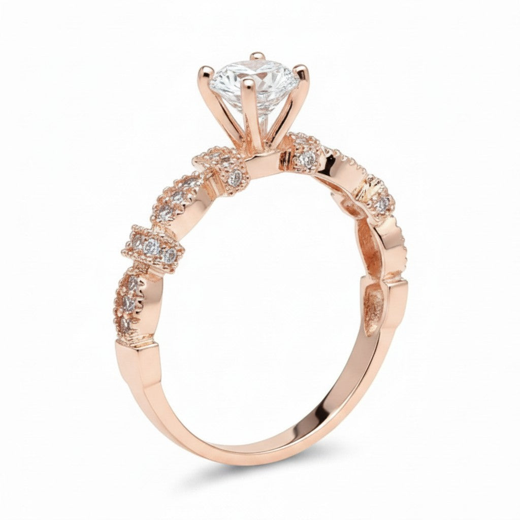 Jade18k Queen engagement ring with moissanite center stone and rose gold band with diamond accents.