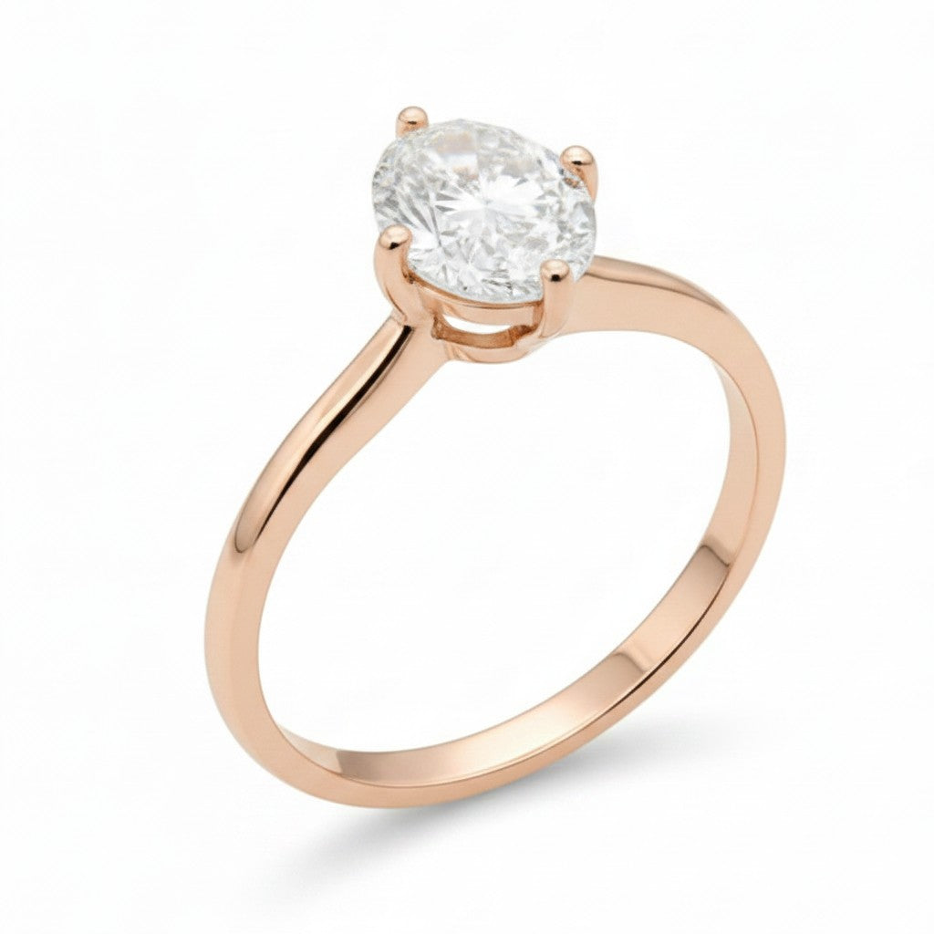 Jade18k Amor Verdadero 18k rose gold engagement ring with oval-cut diamond.